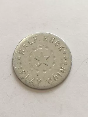 One Vintage Half Buck Play Coin 50 Fifty Token 1-1/8   (NOT A REAL COIN)   H5 • $5.06