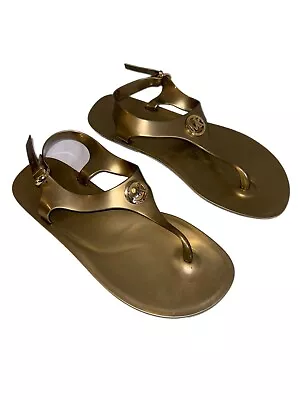 Michael Kors Womens Lillie Gold Size 8 MK Logo Plate Jelly Thong PVC Sandals • $18.99