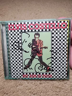 ELVIS COSTELLO Signed Autographed CD My Aim Is True IN PERSON🎵🎶👓💎🖊BEAUTY!! • $41.75