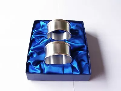 A Pair Of Hallmarked Sterling Silver Napkin Rings With A Modern Brushed Finish • £60