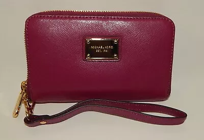 NWOT Michael Kors Zip Around Magenta Fuchsia Leather Wristlet • $49.99