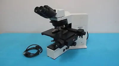 Olympus BX50 Binocular Microscope With Four Objectives And Motorized Stage  • $2700