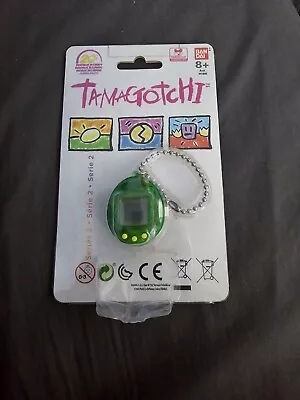 20th Anniversary Tamagotchi - Green And Yellow • £39.99