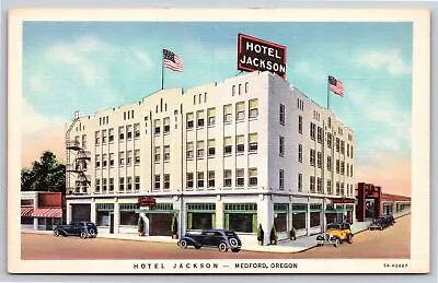 Medford Oregon~Hotel Jackson Bldg Street View~US Flag~Vintage Linen Postcard • $3.70