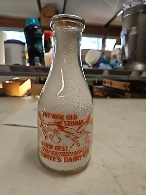 Le Comtes Dairy  The Wise Old Srorks Know Best  Orange Pyro Quart Milk Bottle • $15