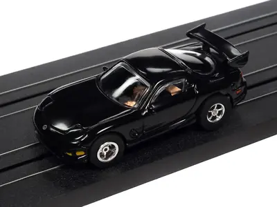 Auto World Xtraction SC368 R34 1995 MAZDA RX7 (BLACK) HO Scale Slot Car • $33.99