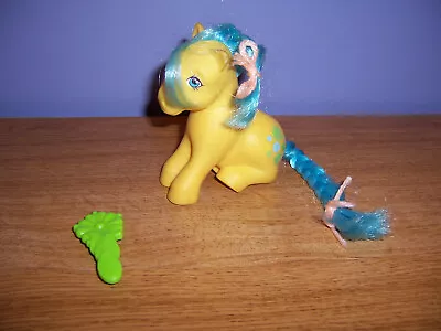 Vintage 1983 My Little Pony G1 Bubbles Sitting With Green Flower Brush • $24.99