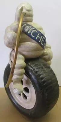 Michelin Man Sitting On A Tire With Hose Blowing Up The Tire • $60