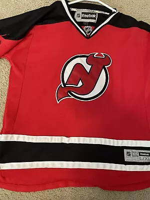 $40 • Buy Reebok New Jersey Devils Zach Parise 9 Red Hockey Jersey Youth Size L/XL