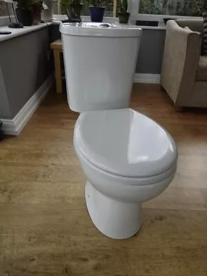 Close Coupled Toilet And Ideal Standard Wall Mounted Sink. • £25