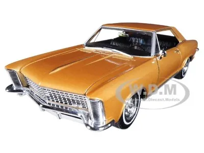 1965 Buick Riviera Gran Sport Gold 1/24 Diecast Model Car By Welly 24072 • $17.49