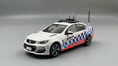 1:43 NSW Police Highway Patrol 2018 VF Series II Commodore Sedan Heron White • $160