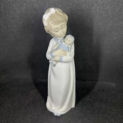 Zaphir 9 1/2  Porcelain Figurine Young Girl Holding A Doll Made In Spain  • $28