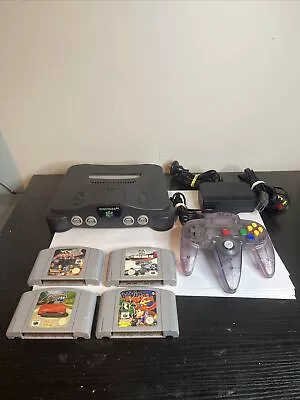 Nintendo 64 Console & 4 Games Purple Controller. • $260