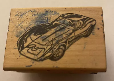 Rubber Stamp Race Car    1” H X  1.75” W • $4.25