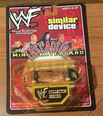 1999 WWF Fast Action Mini Skateboard Stone Cold On Board • $8.95