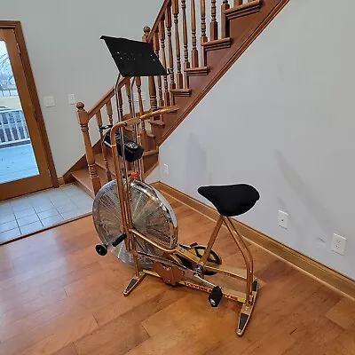 Vintage Schwinn Air-Dyne Dual Action Stationary Gold Exercise Bike W/Book Rack  • $375.99