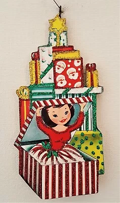 WOMAN In STACK Of WRAPPED GIFT BOXES * Glitter CHRISTMAS ORNAMENT * Vtg Img • $10.50