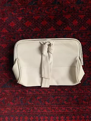 A Detacher Hinged Knot Clutch In Cream Leather • $140