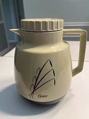 Vintage OSTER Carafe 56 Oz Insulated Thermos Coffee Tea Pitcher Dial Lid • $22.89