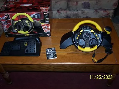 Madcatz2  MC2 Universal Racing Wheel  And Pedals • $20