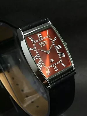 Seiko Slim Quartz New Battery Red Face Black Band Japanese Men's Wrist Watch • $22.99