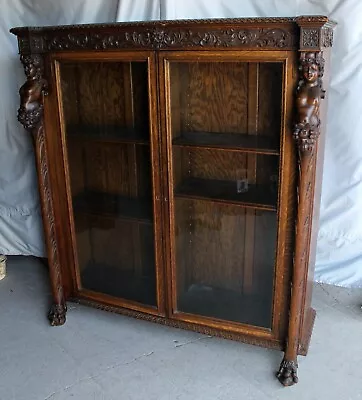 Antique Double Door Oak Bookcase With Highly Carved Maidens - RJ Horner Company • $15000