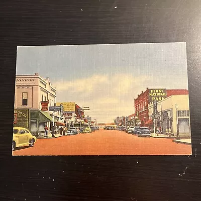 LINEN Postcard--NEW MEXICO--Las Cruces--Main Street--Storefronts-Bank Drug Store • $1.95