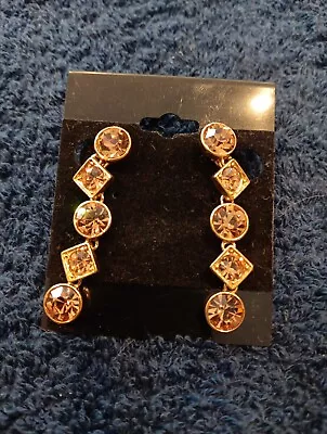 Vintage Monet Gold Tone Champagne Rhinestone Dangle Clip-On Earrings Drop • $19.99