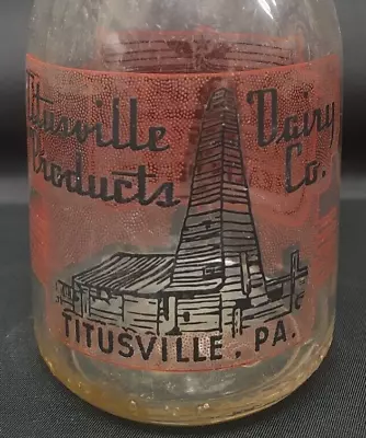 Titusville Dairy Titusville Pa Pennsylvania Red & Black Pyro Quart Milk Bottle • $24.99