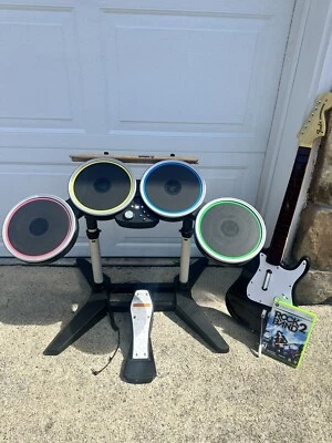 $150 • Buy Xbox 360 Rock Band Wired Bundle Drums Pedal Guitar Strap Sticks And Game