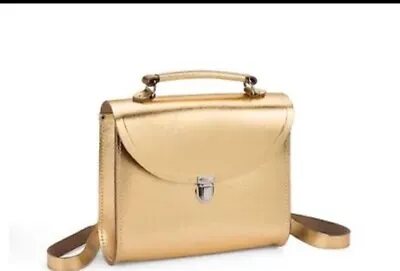 The Cambridge Satchel Company  The Poppy Backpack Saffiano Leather Metallic Gold • £39.95