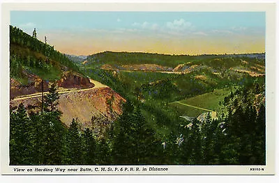 MT Montana:  Harding Way C. M. St. P. & P RR In Distance  CT American Art Card • $3.99