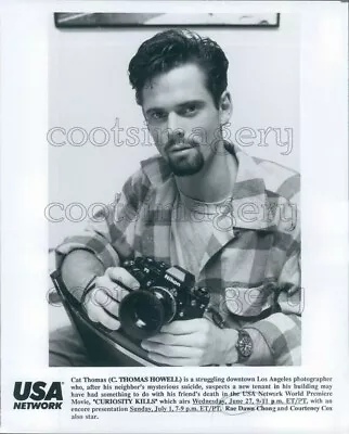 Press Photo Handsome C Thomas Howell With Nikon Camera • $15