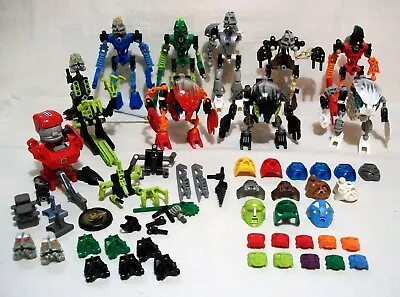 Lot Of Lego Bionicle Action Figures Masks Weapons And Miscellaneous *LOOK* • $125