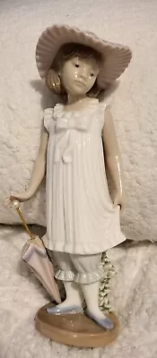 Nao By Lladro Girl With Umbrella- April Showers. • £8