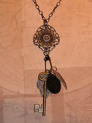 Victorian Steampunk Necklace Time Warped Watch Gear Key Wing Black Oval Pendant  • $24.99