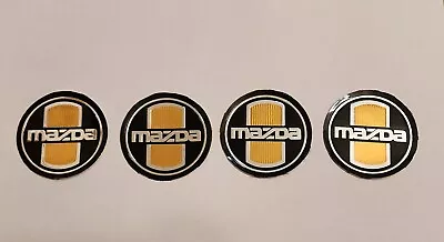 Set Of 4 NOS Vintage MAZDA Embossed Center Cap Decals / Stickers - 54mm • $9