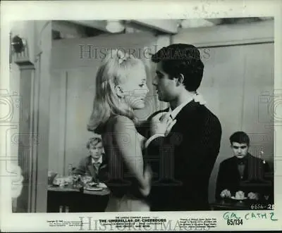 1965 Press Photo Catherine Deneuve And Co Star In  The Umbrellas Of Cherbourg  • $17.99