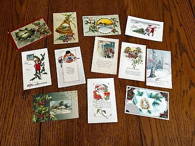 Lot: 12 Vintage Christmas Postcards Santa Children Angels Holly • $6