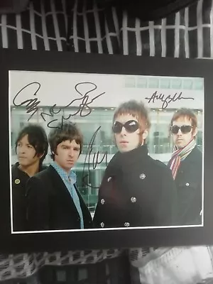 Oasis Signed Photo • £220