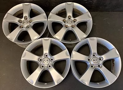 (4) Mazda 3 Original Silver Wheels Rims + Caps 17  Hol.64861 • $549