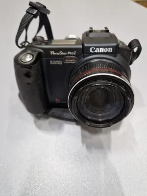 Canon PowerShot Pro1  8.0MP 7x Digital Camera Black Without Battery For Parts • £46.27