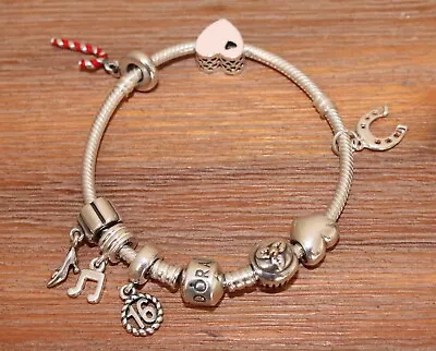 PANDORA Bracelet With 8 Charms • $190