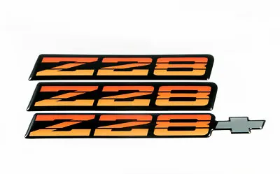 82-84 Camaro Z28 OEM Tri Color Red/Orange Rocker Emblem Set Z28EMBTRICOLORRED • $49.95