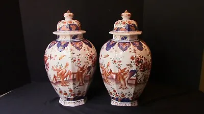 An Extraordinary Pair Of Hand-Painted Ribbed  Delft Urns • $1785