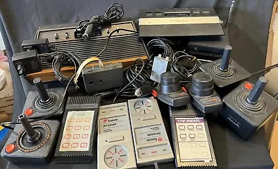 Massive Atari 2600 And Jr Console Game Lot Wireless Paddles Star RaiderMario • $199.99