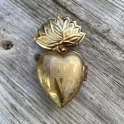 Sacred Heart Milagros Tin Small Locket  • $20