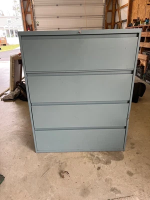 $100 • Buy 4 Drawer Lateral File Cabinet