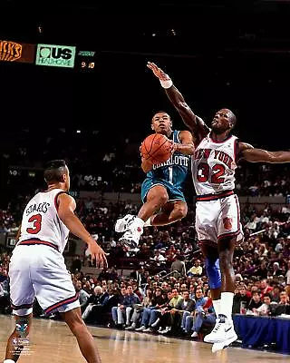 Muggsy Bogues Charlotte Hornets Unsigned Teal Jersey Mid-Air Vs Knicks Photo • $24.99